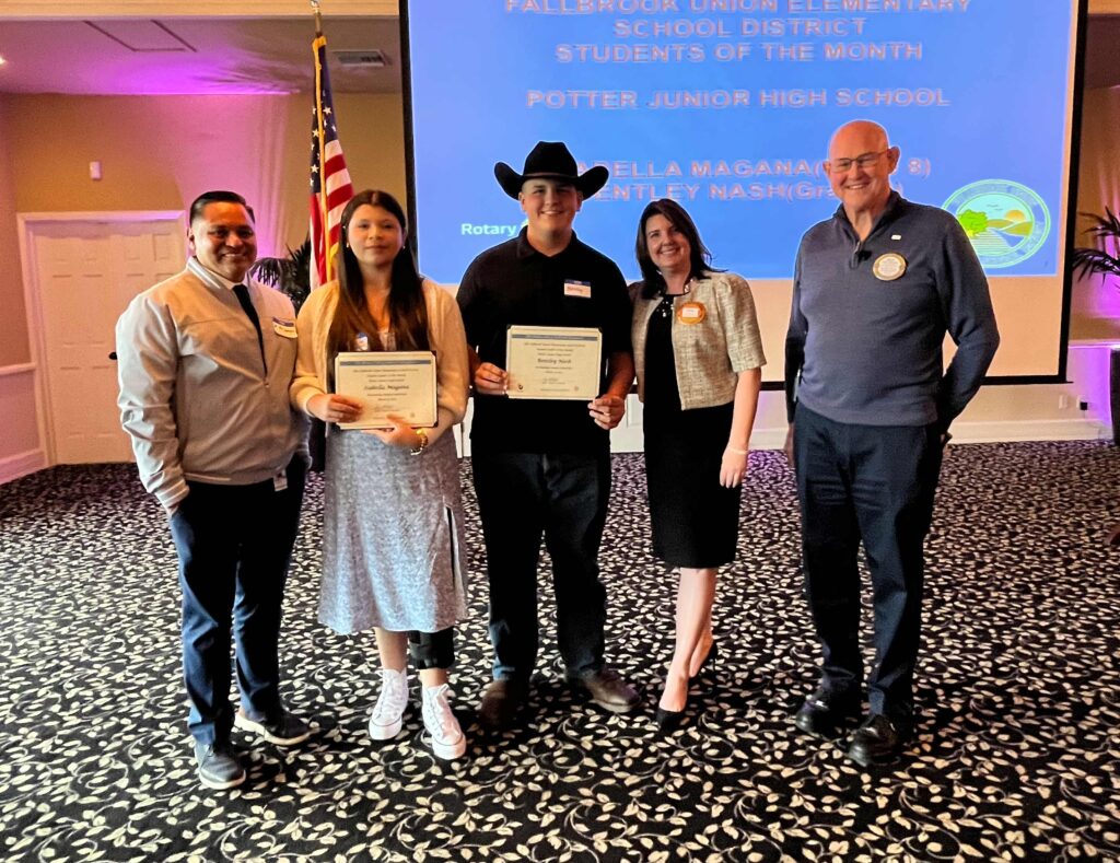 FUESD and Rotary Leaders Standing with Celebrated Students