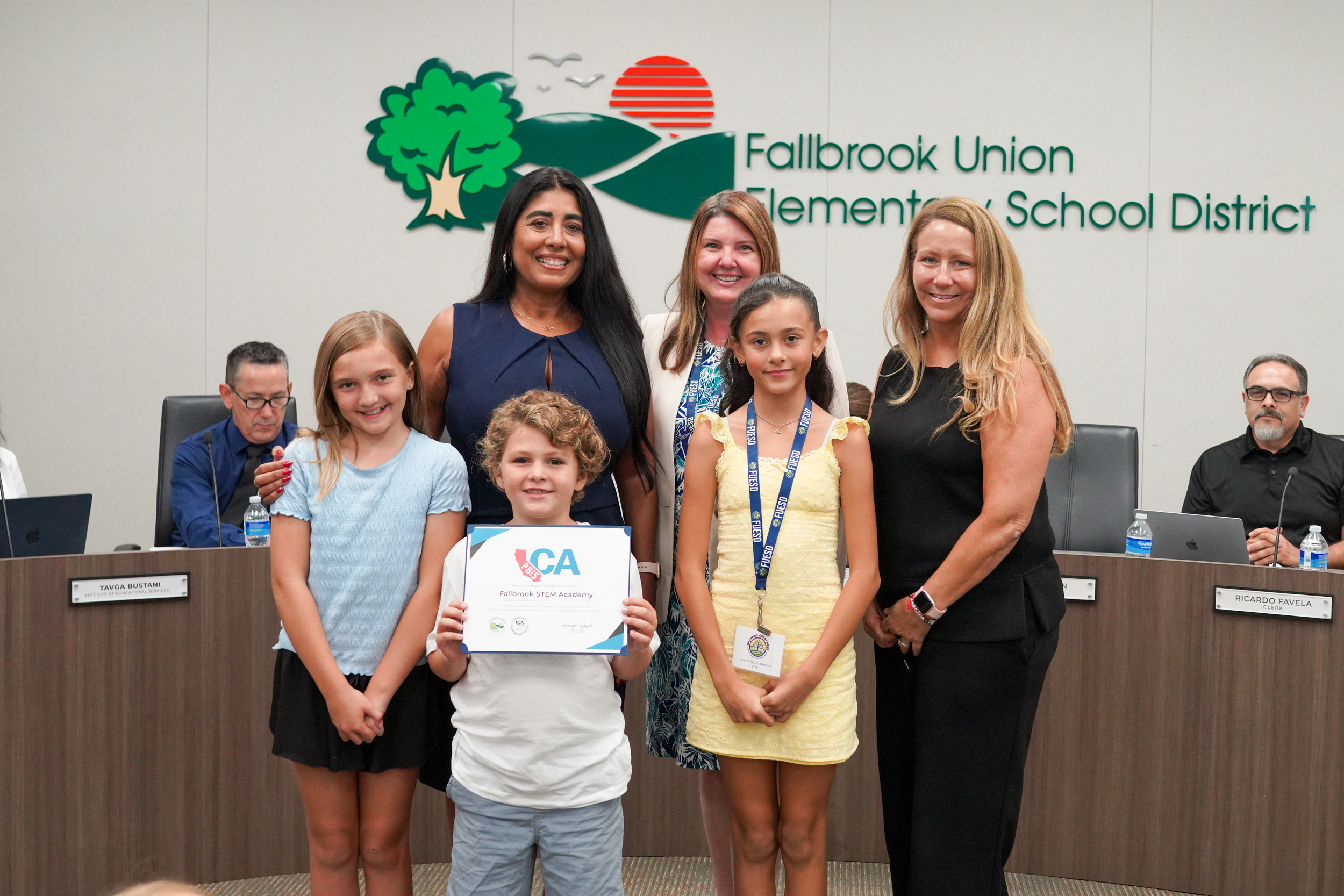 FSA Staff receiving a certificate from FUESD Superintendent